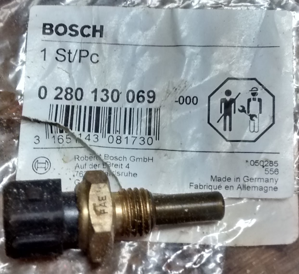 A Bosch engine coolant temperature sensor for a 1995 Volvo 940.  The label shows that it should only be handled by professionals, which is nonesense, because it just takes a single ~19mm socket to install.